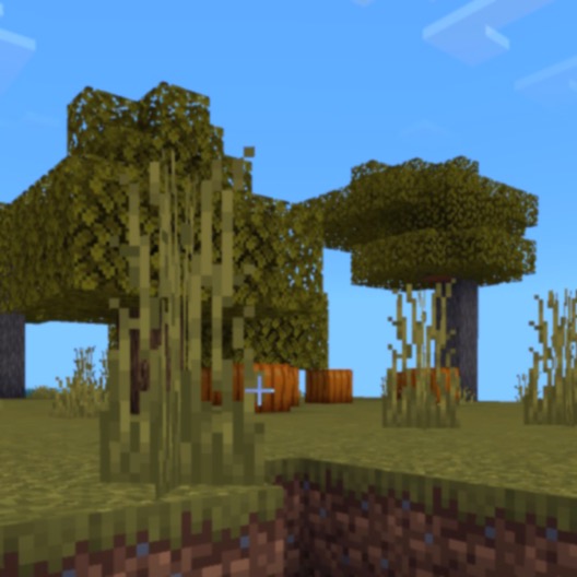 a screenshot of Minecraft, there are a few trees and pumpkins under a blue sky