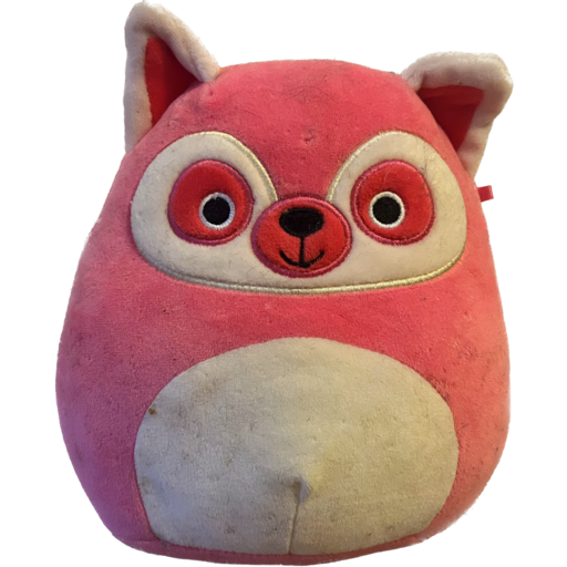 Lucia, a pink Squishmallow racoon. She resembles a marshmallow with her rounded body!